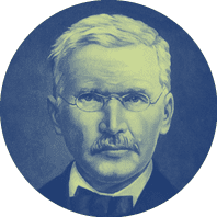 A man with a beard and mustache is wearing a suit and tie. Description generated by AI