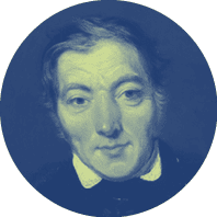 A man wearing a black suit and tie. Description generated by AI