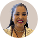 Pessoa adulta com cabelo preso para tr s usando batom vermelho, brincos dourados, colar prateado e camisa branca com bolinhas pretas, sorrindo em fundo neutro circular. Description generated by AI